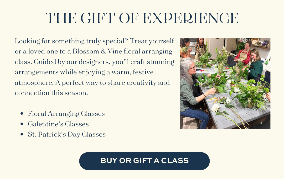 Guests creating floral arrangements during a Blossom & Vine floral design class and workshop experience