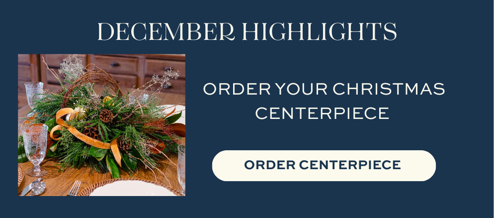 Christmas centerpiece arrangement featuring evergreen foliage, pinecones, ribbon accents, and natural holiday elements