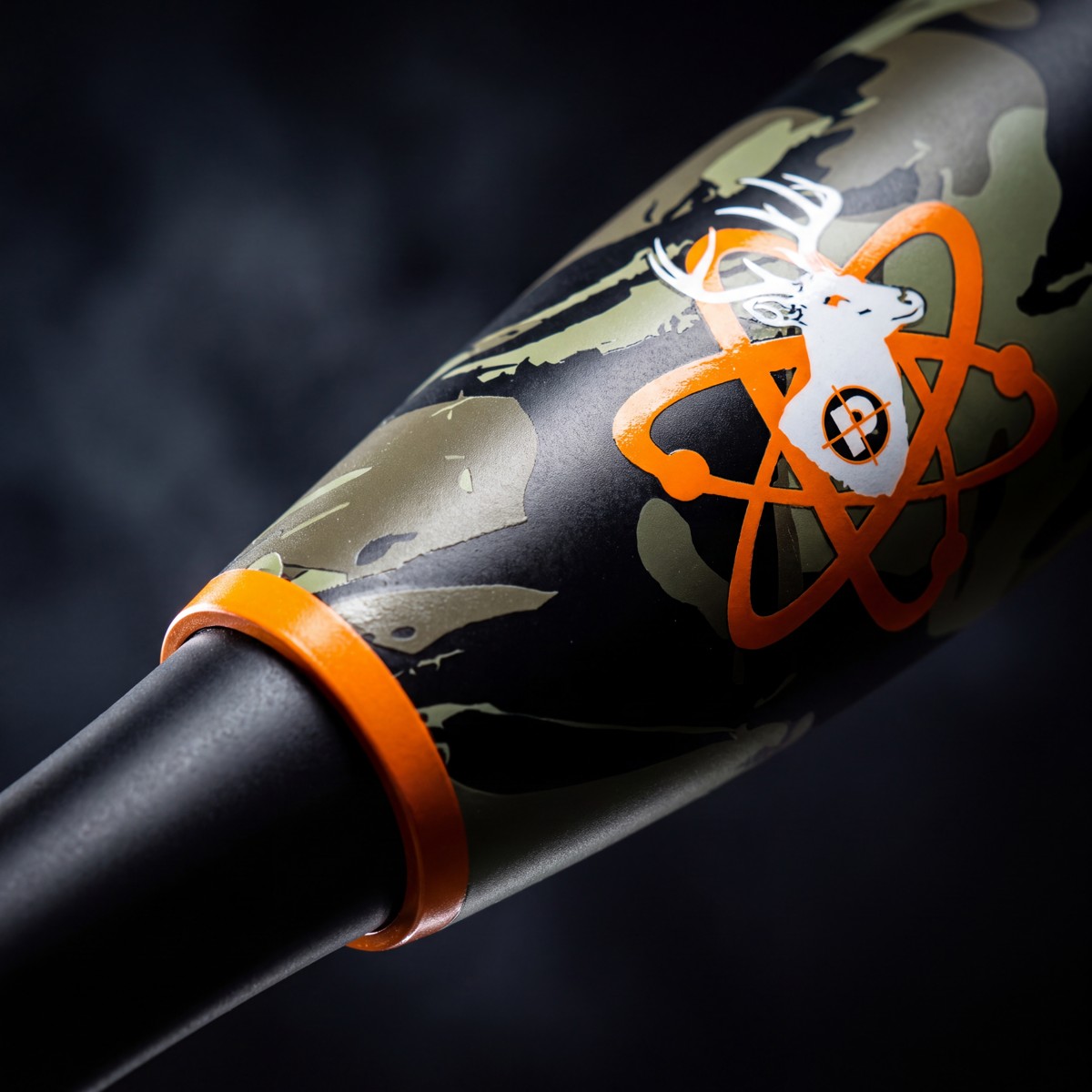 Macro close-up of the Yee Yee barrel crest with the orange Proton atom
