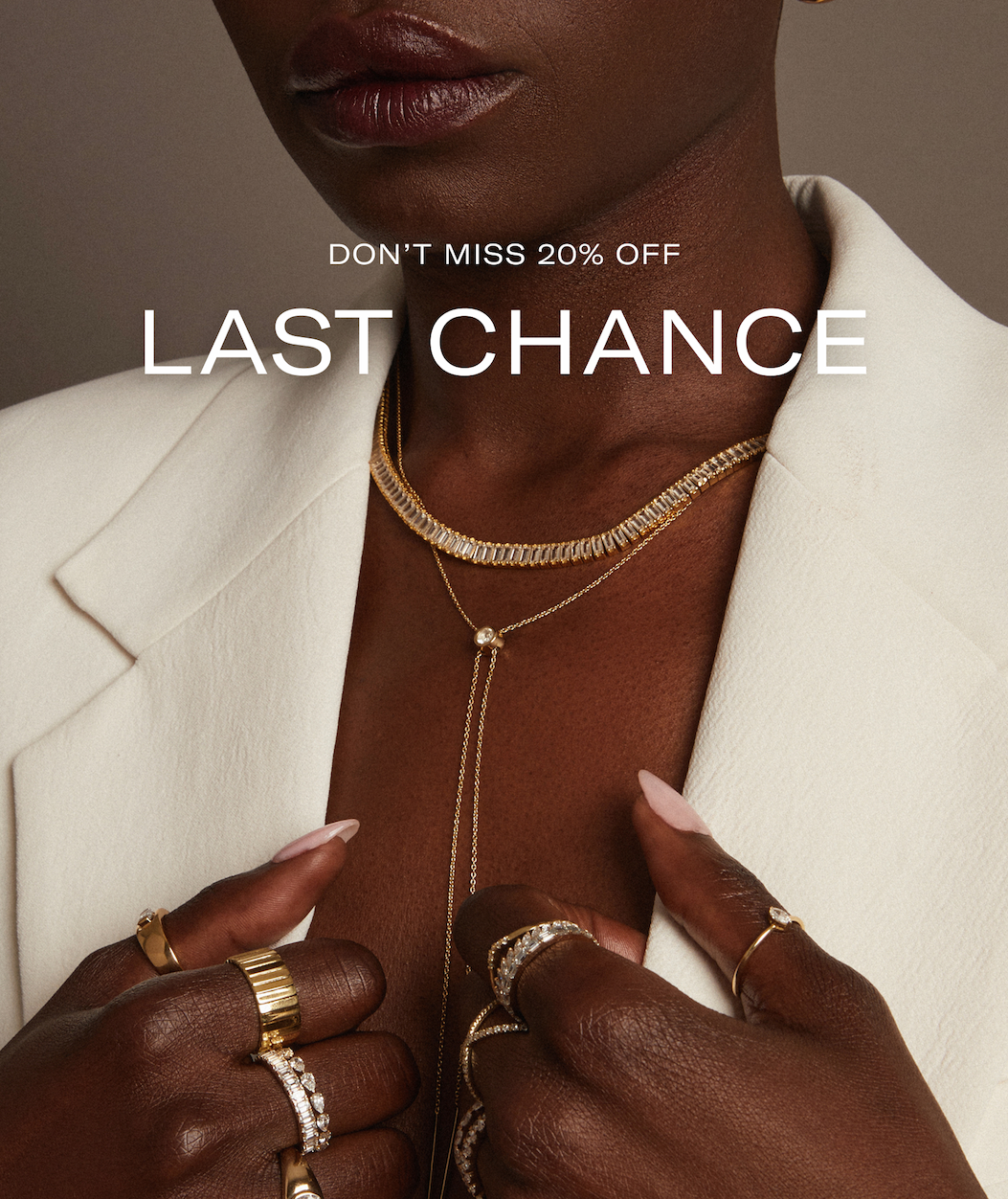 an image of a stack of gold and diamond rings with a diamond ring on top