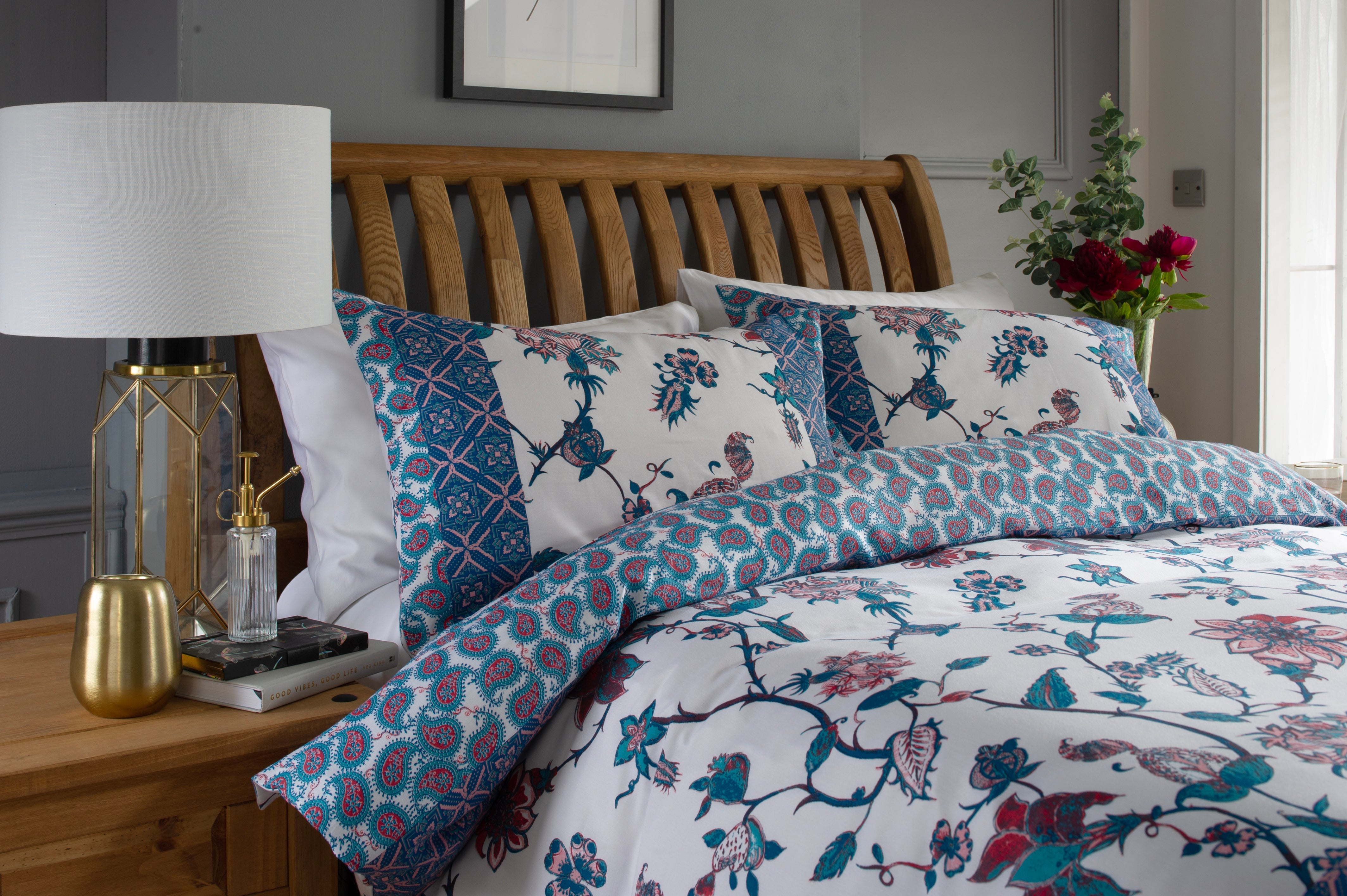 Luxury white bedding set from Deyongs, styled in a modern bedroom