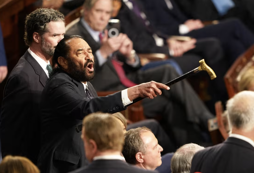 Rep. Al Green, D-Texas, disrupts President Donald Trump as he addresses a joint session of Congress.