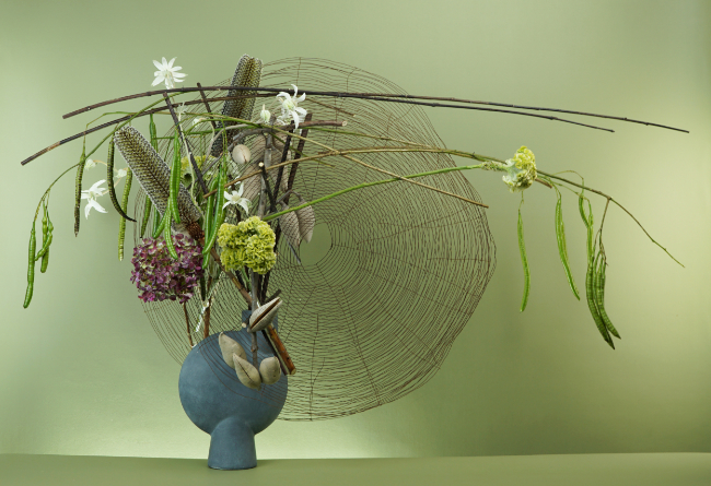 Floral design in an asymmetrical concrete container by Mark Pampling, for the online course One Container Five Elements