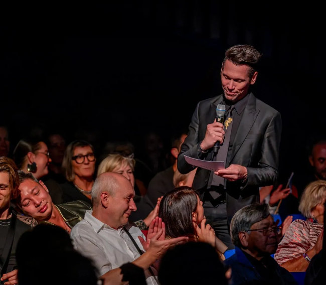 Bart Hass and his downward directed hand tied bouquet for the 2019 FTD-Interflora World Cup. in Philadelphia
