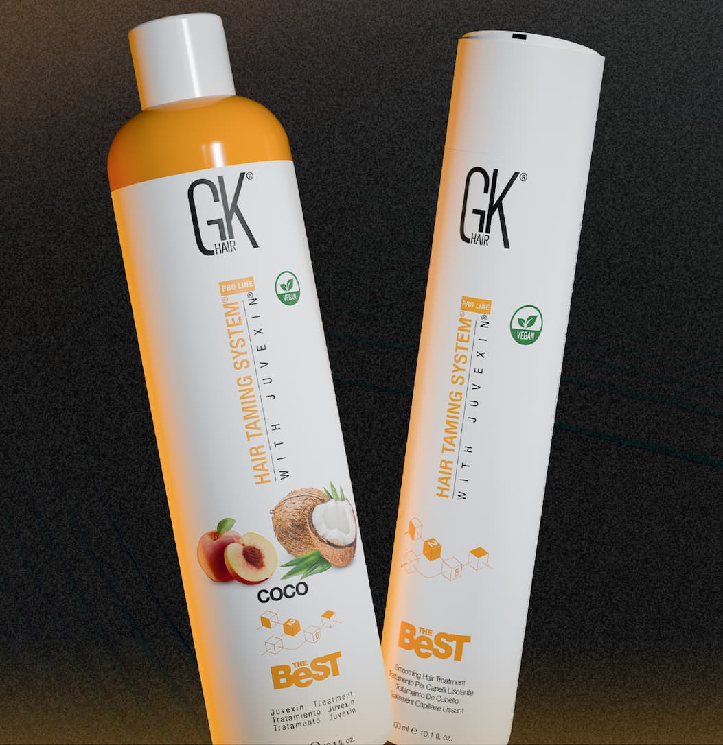 Two GK Hair Taming System bottles with coconut graphic