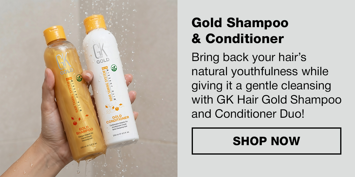 Hand holding GK Hair Gold Shampoo and Gold Conditioner bottles under running water, with a Shop Now button.