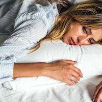 This Hormonal Shift Explains Pre-Period Mood Swings & Brain Fog