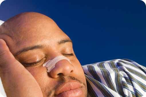 Man wearing a nasal strip