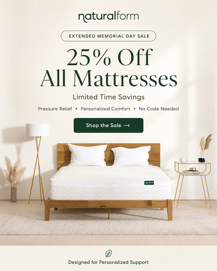 an image of a woman laying on a bed with a mattress
