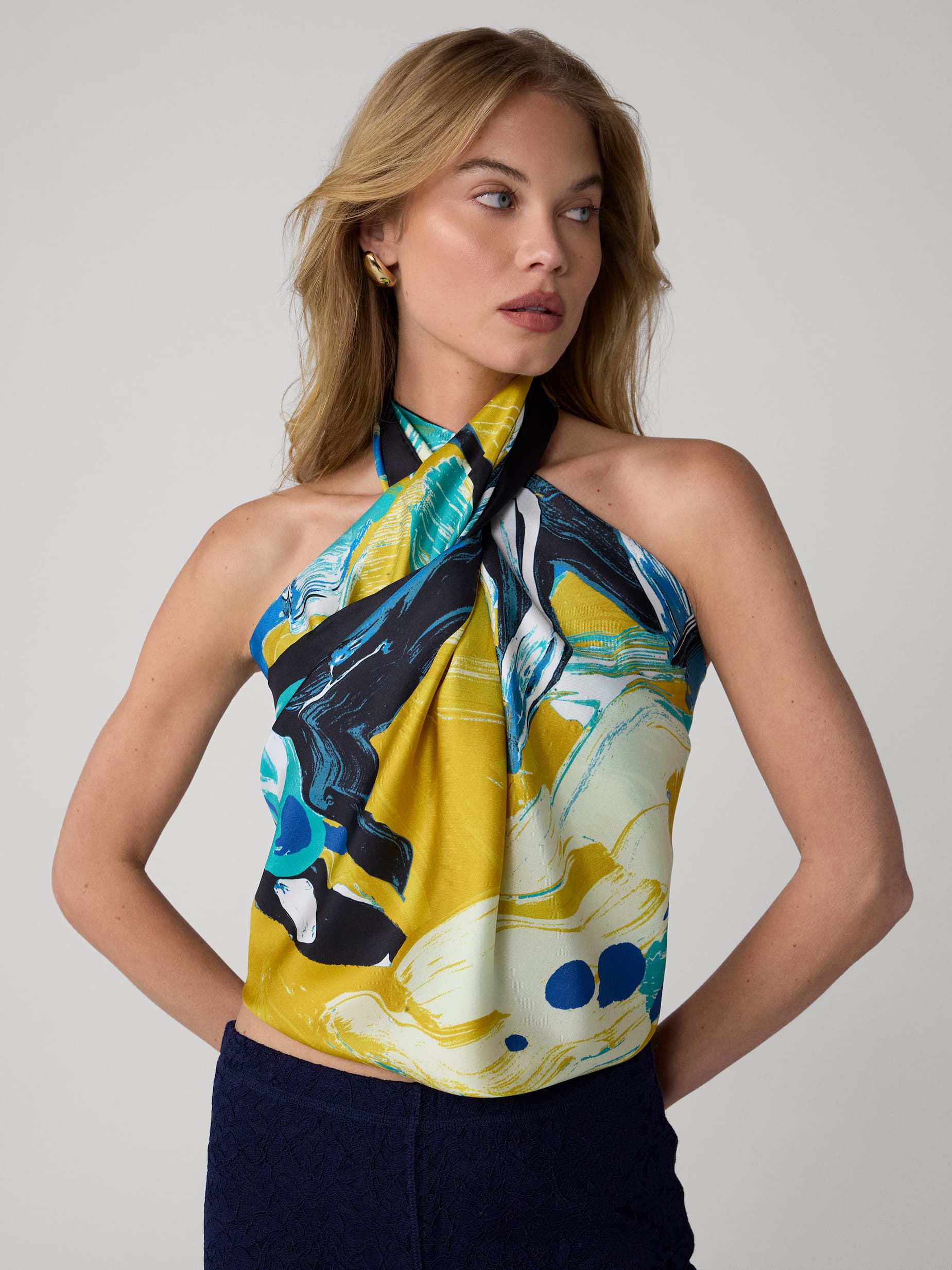green and blue scarf worn as a top