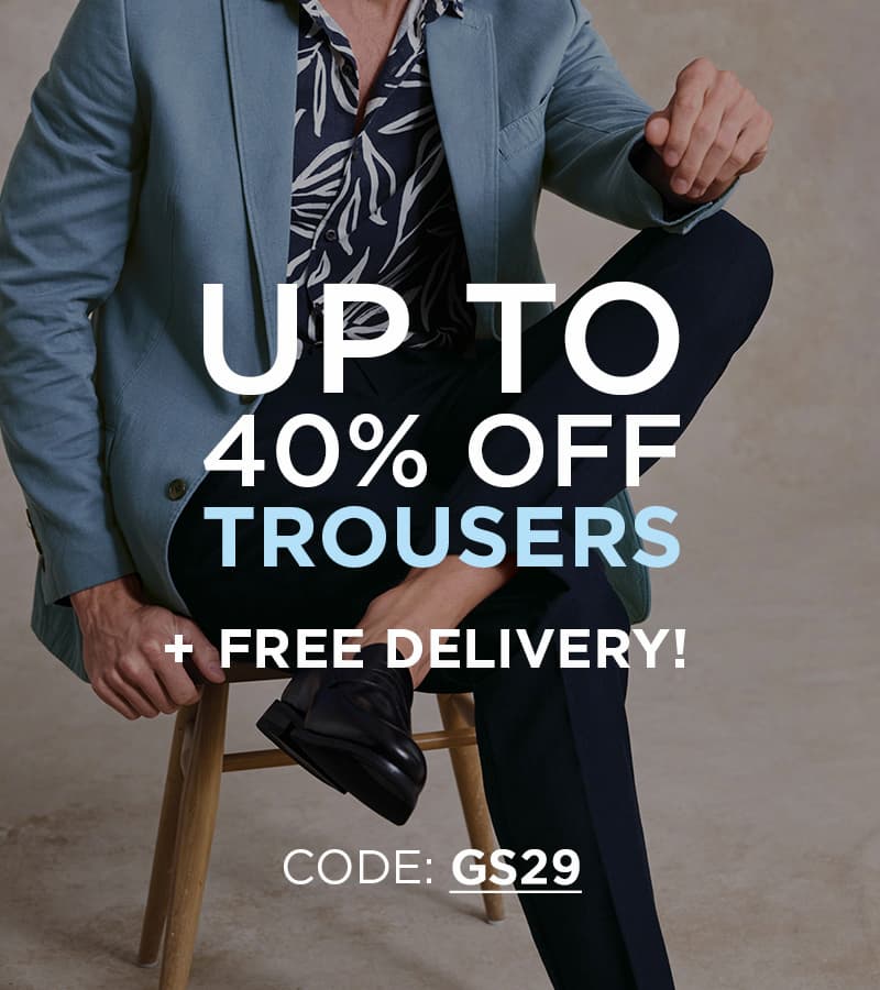 an image of a pile of men's pants with the words 40 % off