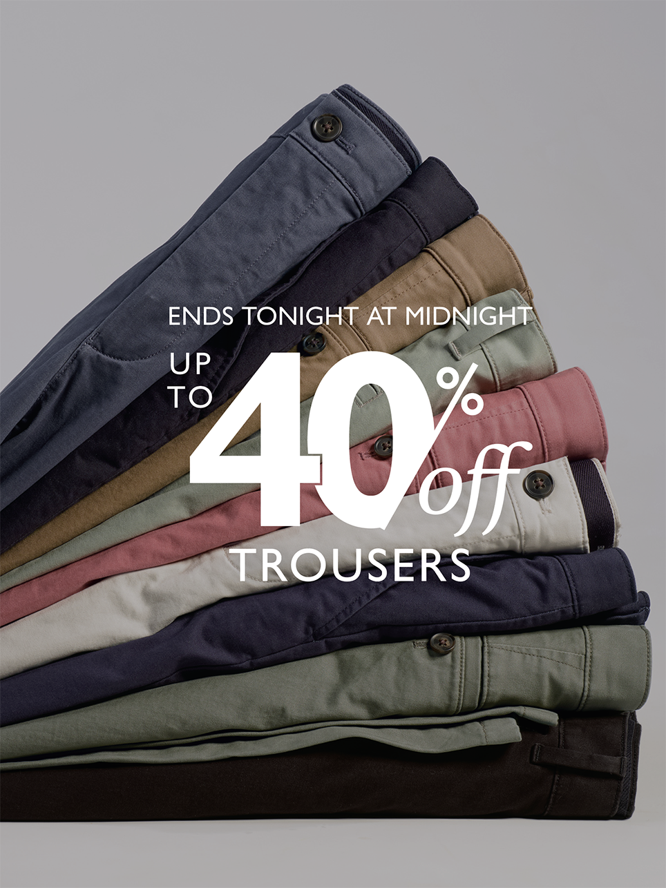 an image of a pile of men's pants with the words 40 % off