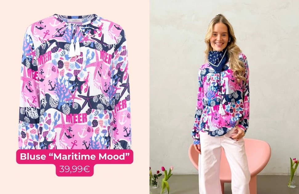 an image of a woman wearing a pink and blue shirt and white pants