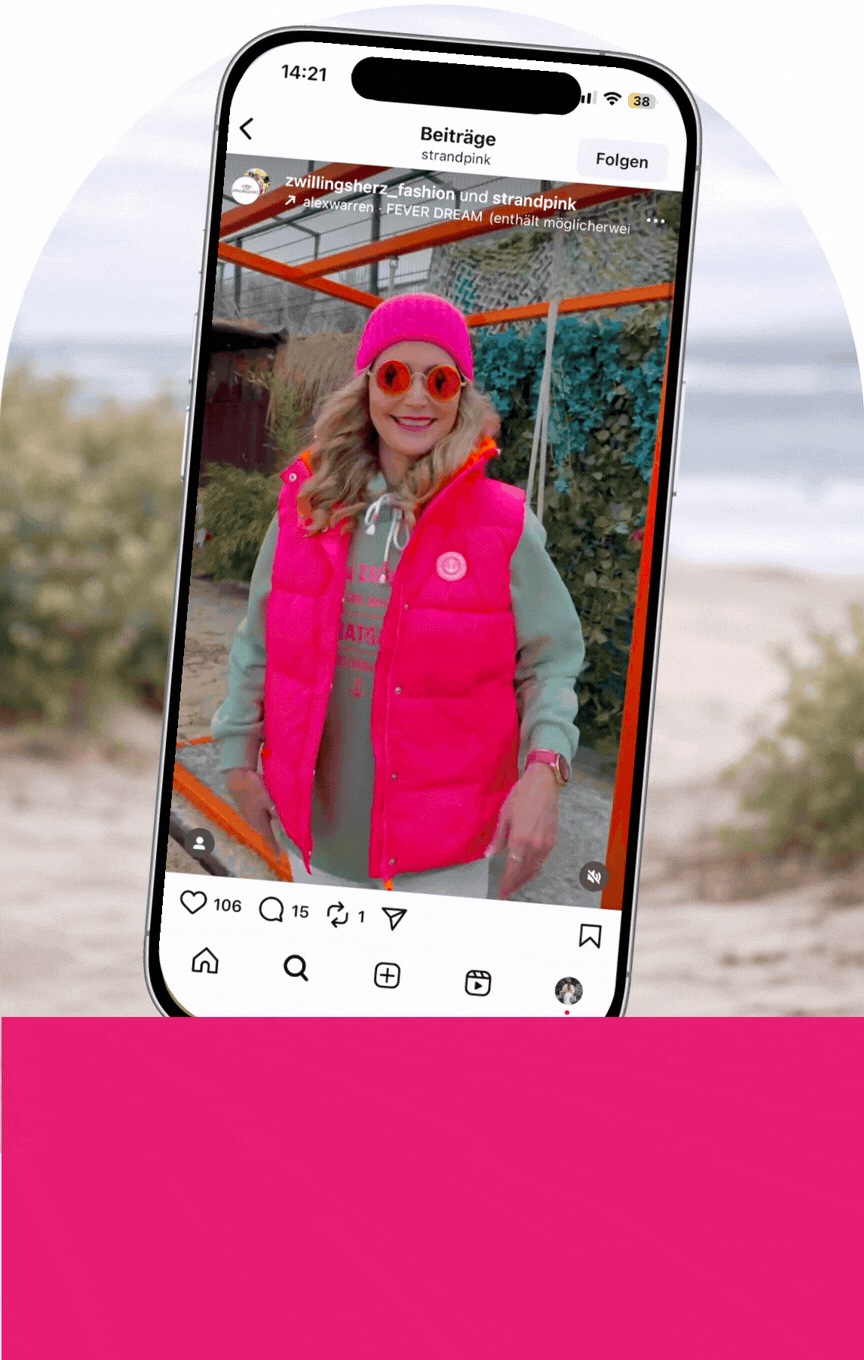 an image of two women in pink shirts and jeans posing for a picture