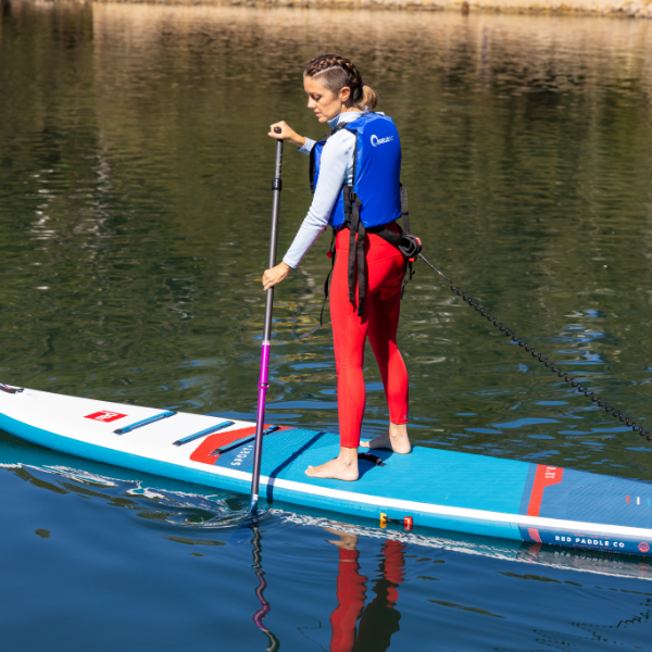 Woman on a Red 12'6" Sport+ MSL board
