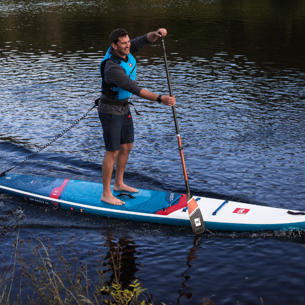 Man on a Red 14'0" Sport+ board