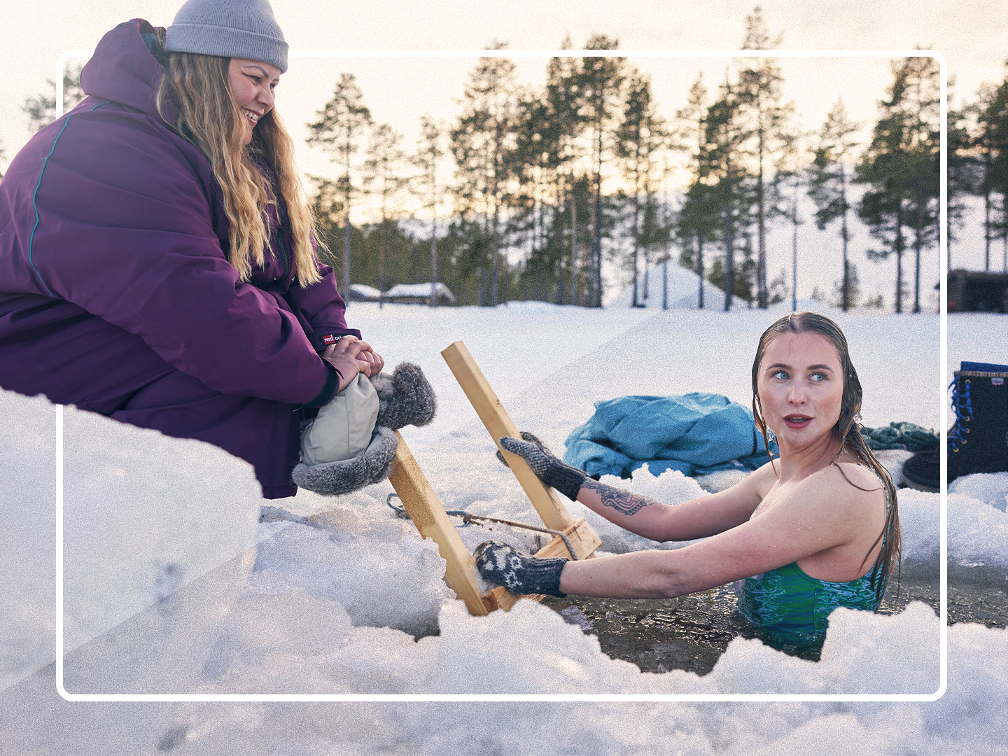 Women wearing Pro Change Robe EVO after ice swimming