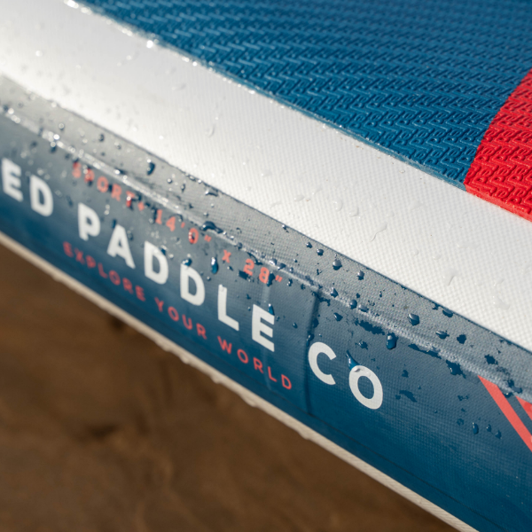Graphics on the rail of Red Paddle Co inflatable paddle board