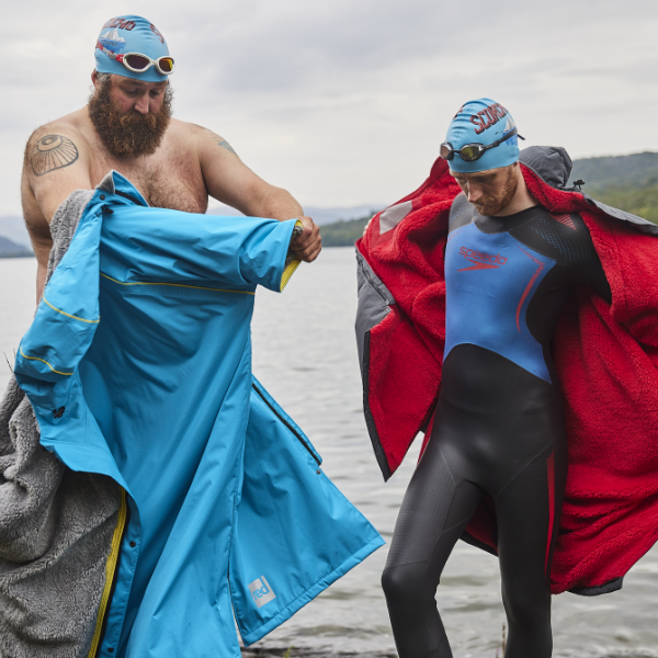 wearing Pro Change Robe EVO to change into swimwear