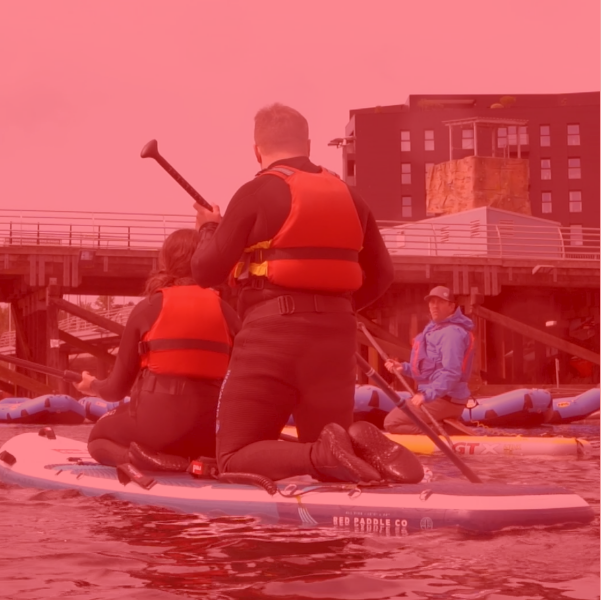 Two people paddling on the 12'0" All Ride paddleboard