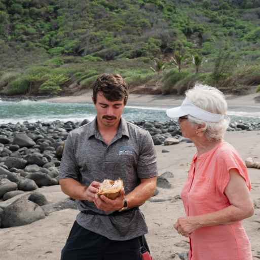 Guide on the beach with a guest | UnCruise Adventures