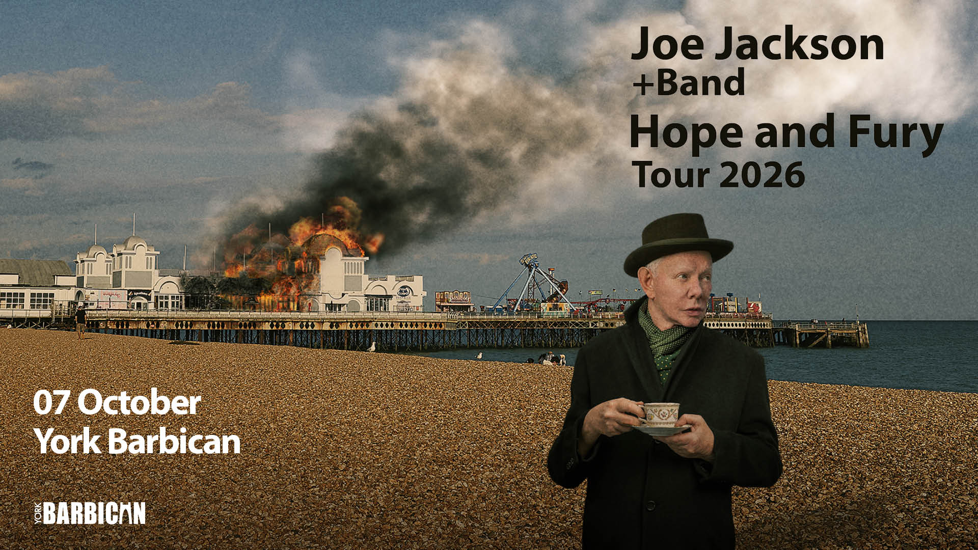 Promotional poster for Joe Jackson + Band’s Hope and Fury Tour 2026, featuring a seaside pier backdrop, dramatic smoke, and York Barbican event details.