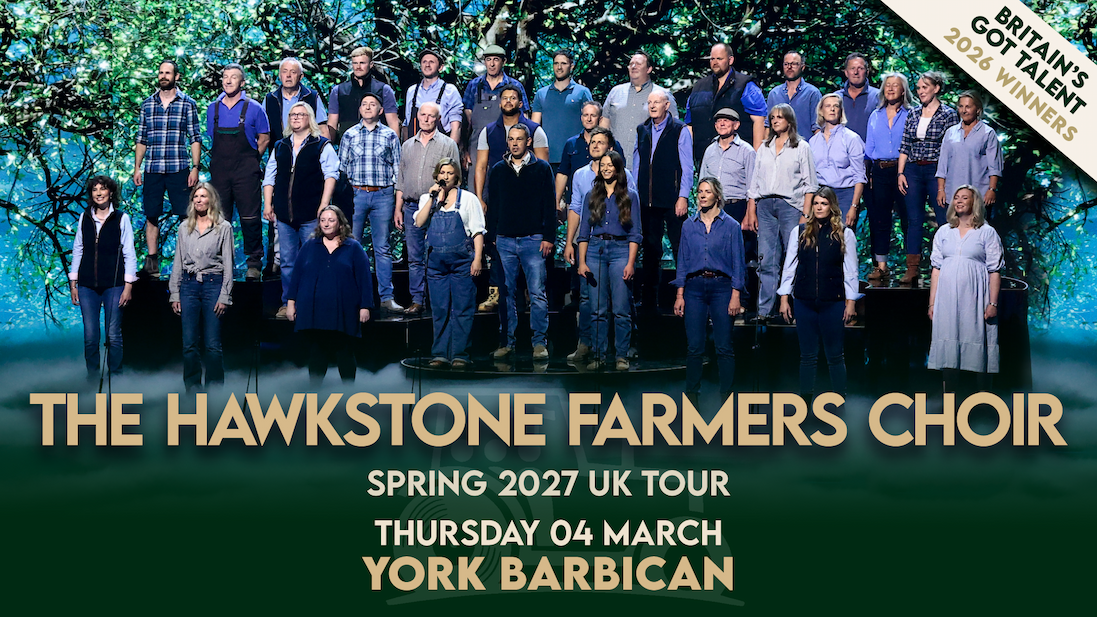 The Hawsktone Farmers Choir performing on stage beneath a woodland backdrop, promoting the Spring 2027 UK Tour at York Barbican on 4 March.