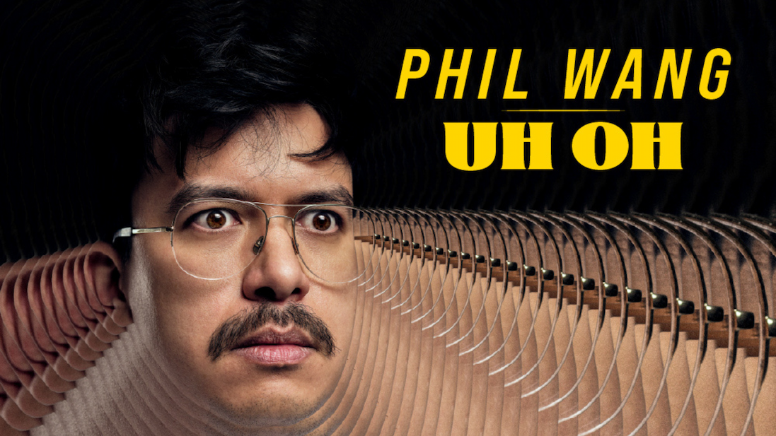 Phil Wang promotional image featuring a close-up portrait with glasses and moustache, overlaid with a repeated motion-trail effect; yellow text reads “UH OH”.