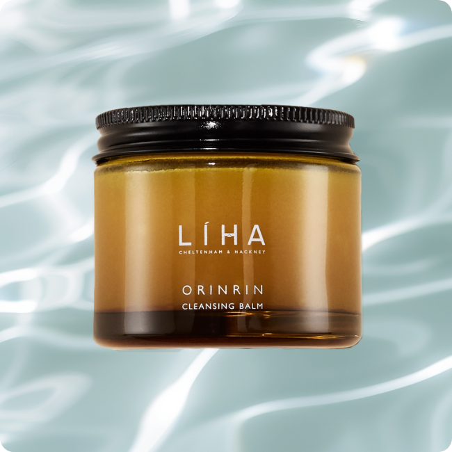 Orinrin Cleasing balm hovering over calm water