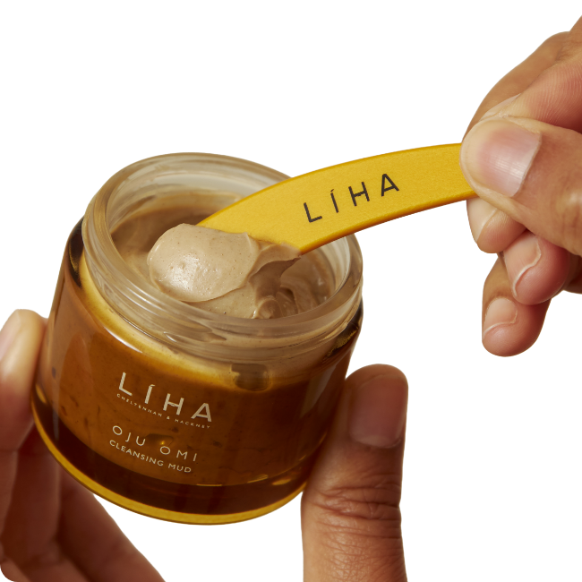 An open jar of Oju Omi Mud Cleanser