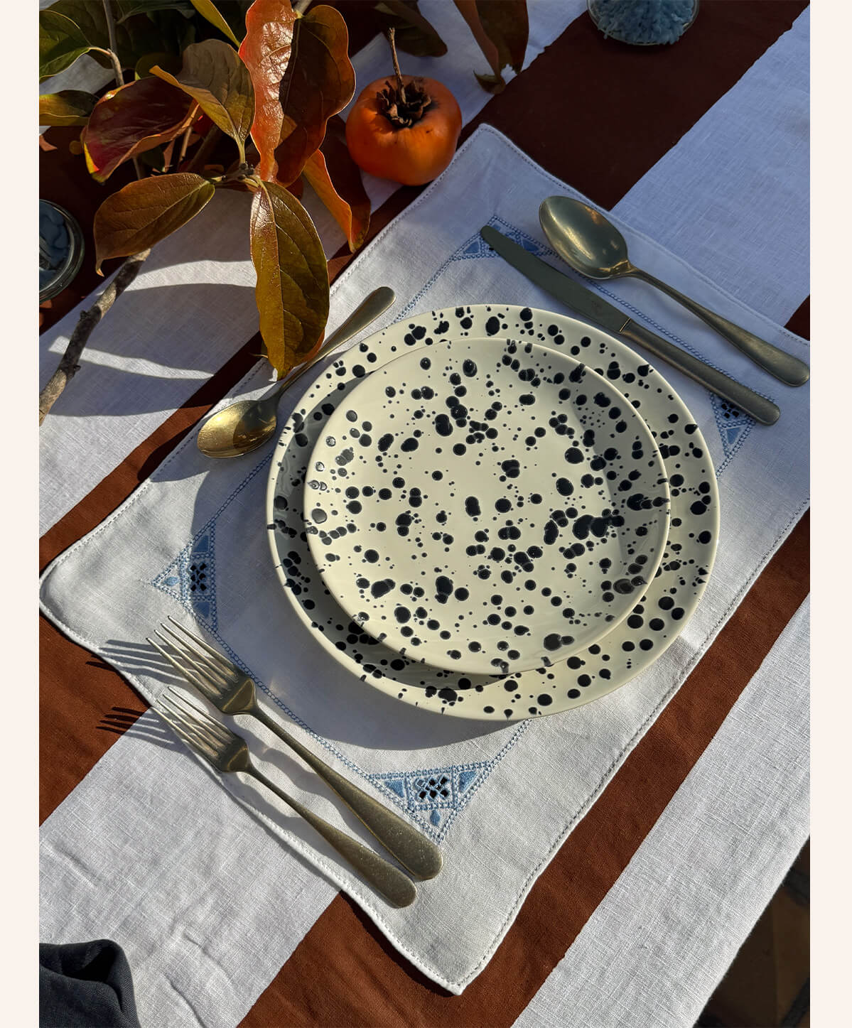 Midnight blues and warm browns set the scene.