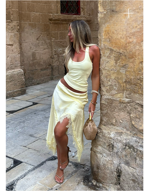 @shaunamullins wears Silka Top and Suay Asymmetrical Midi Skirt - Yellow
