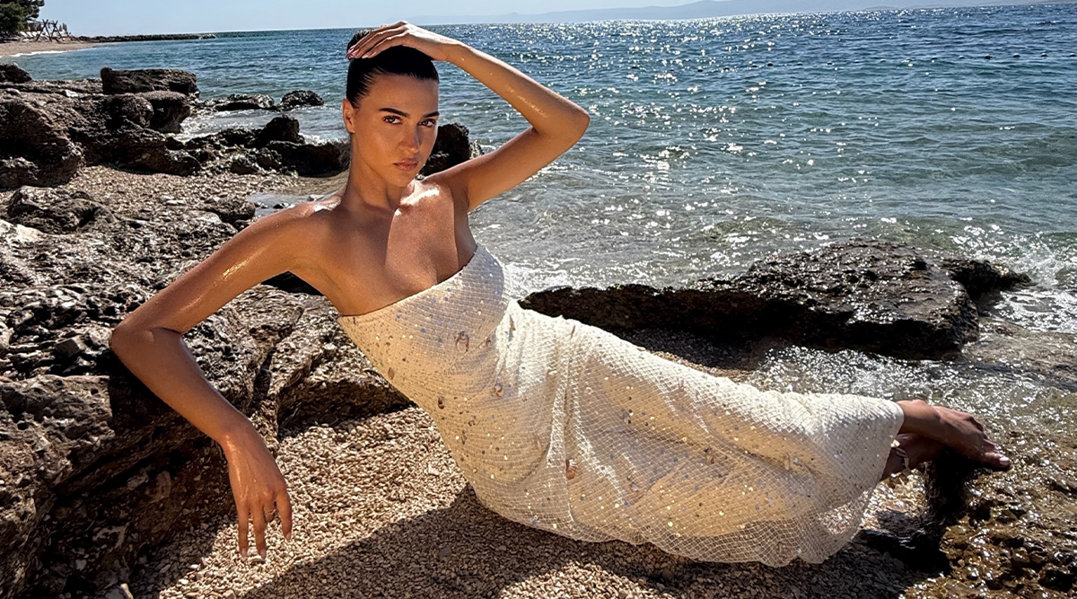 @patricialaelena wears Orelli Shell Sequin Knit Maxi Dress - Ivory