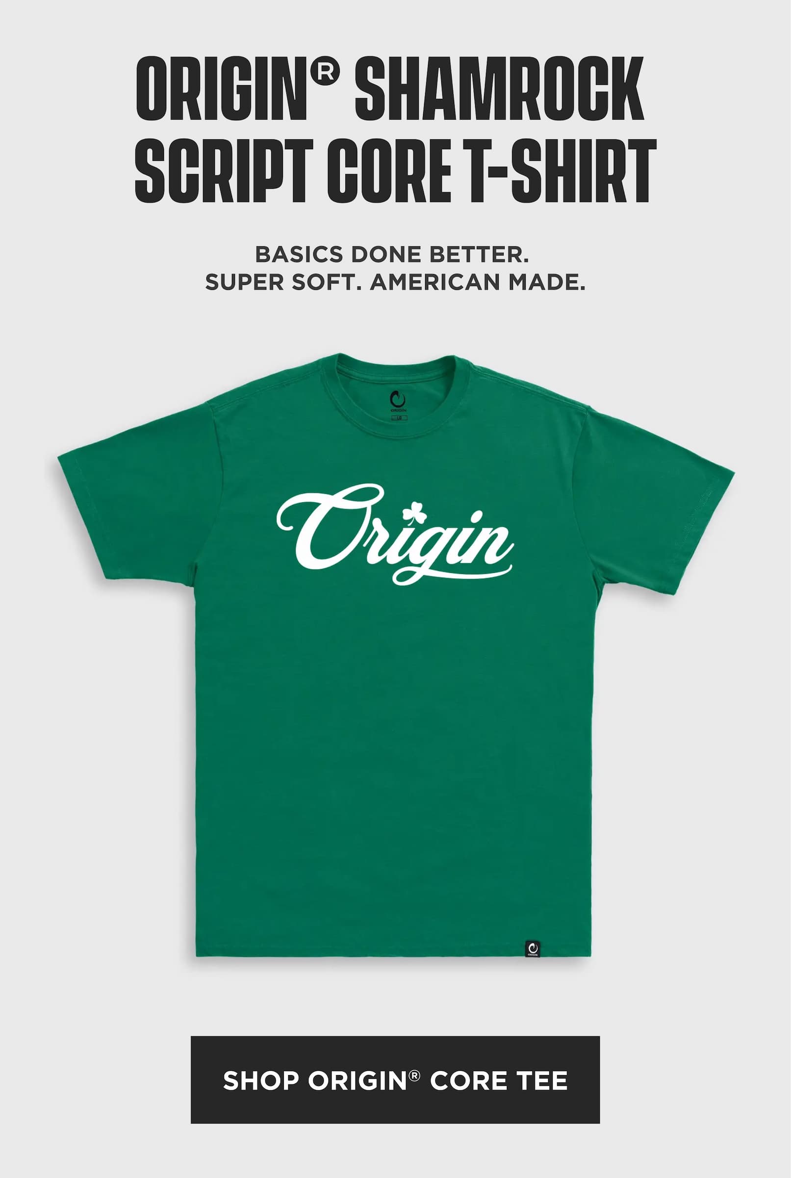 Product image of the green Origin Shamrock Script Core T-Shirt with white Origin script logo and shamrock detail, promoting a soft American-made St. Patrick's Day themed tee.