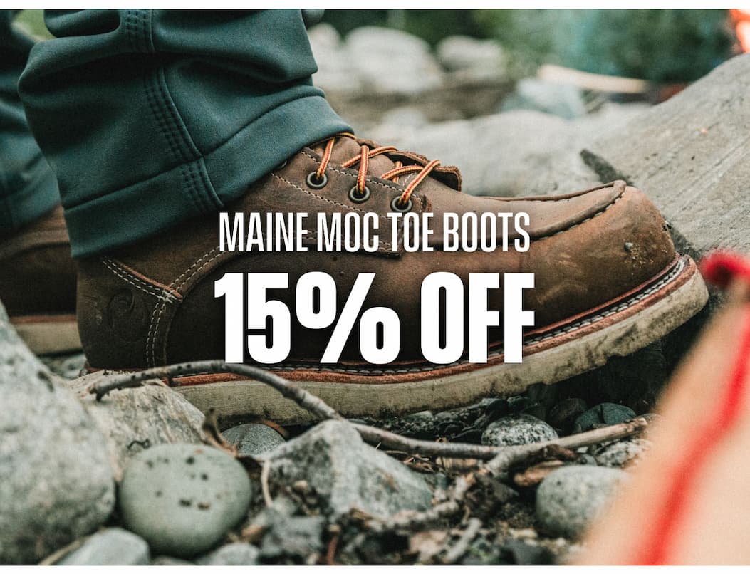 Maine Moc Toe Boots 15% off promo showing a brown moc toe boot on rocky ground.