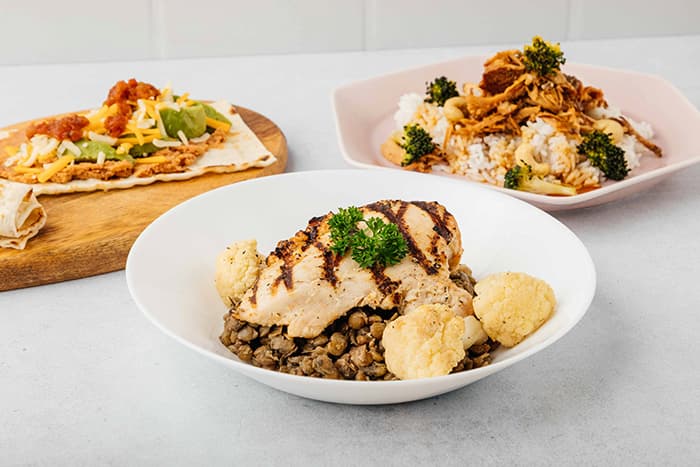 Chicken grain bowl with crispy toppings