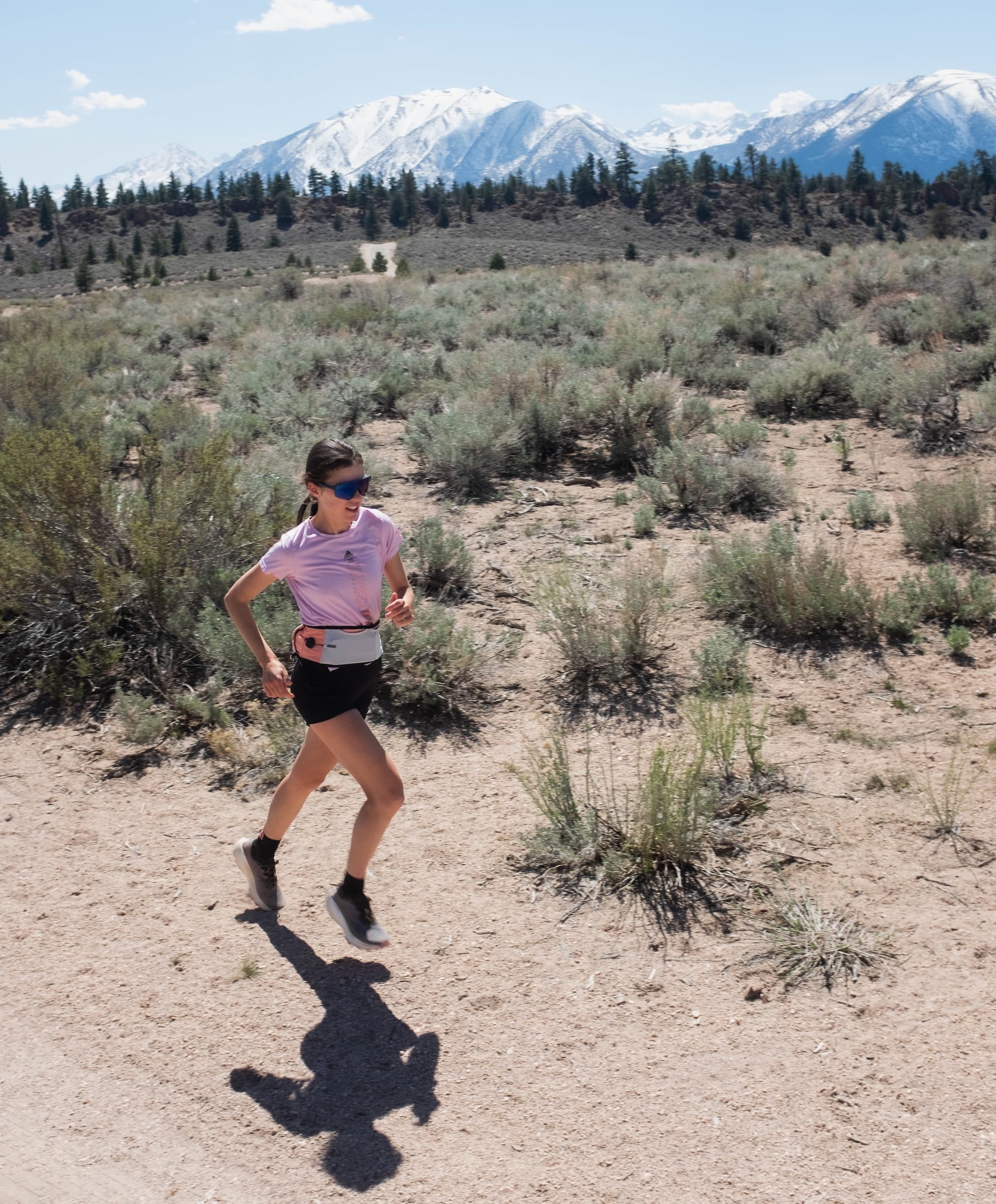 Person wearing a running belt on trail