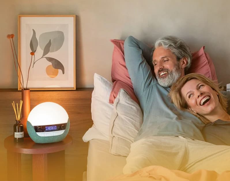 Couple relaxing in bed