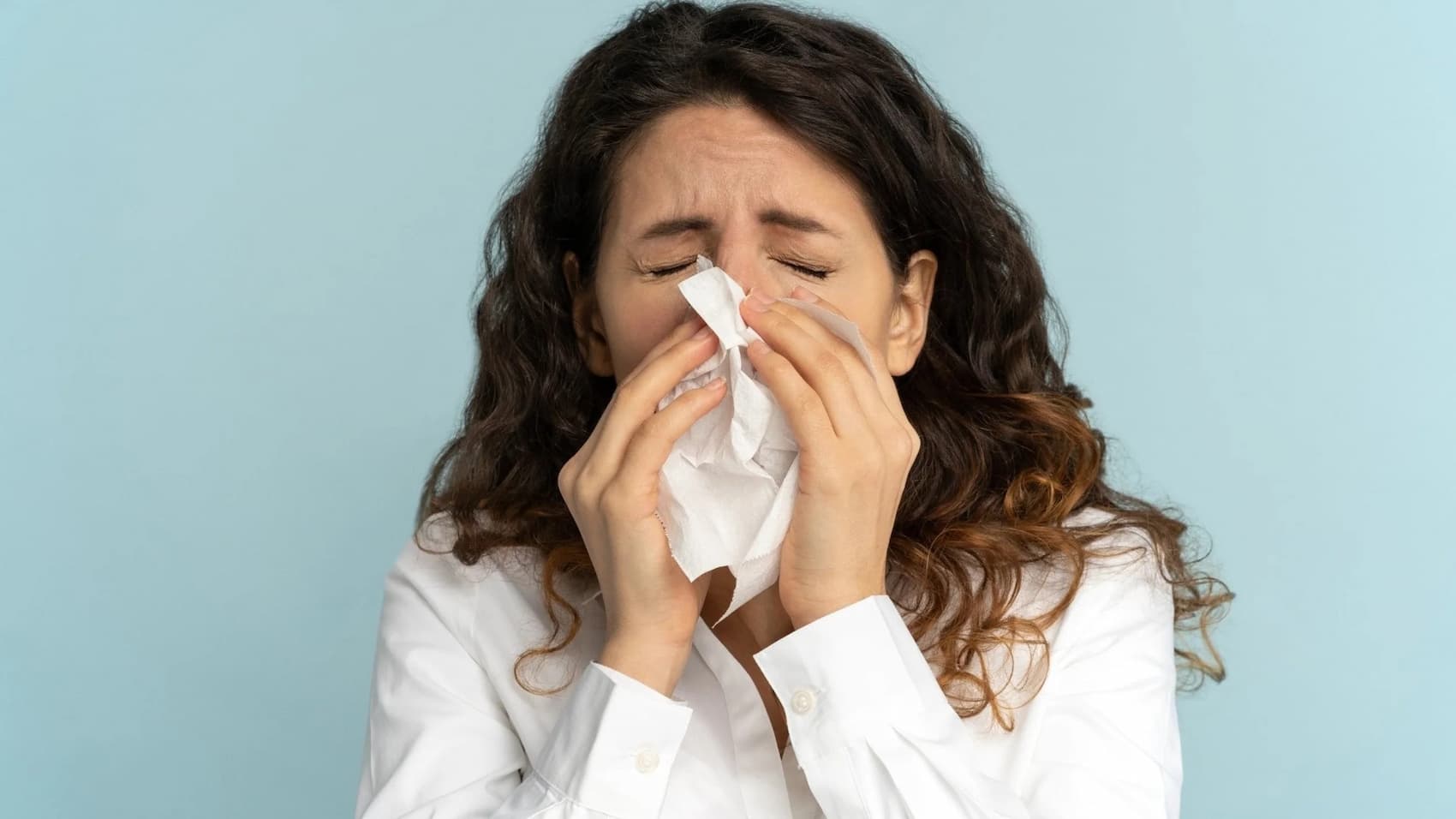 Woman suffering from dust and pollen allergens