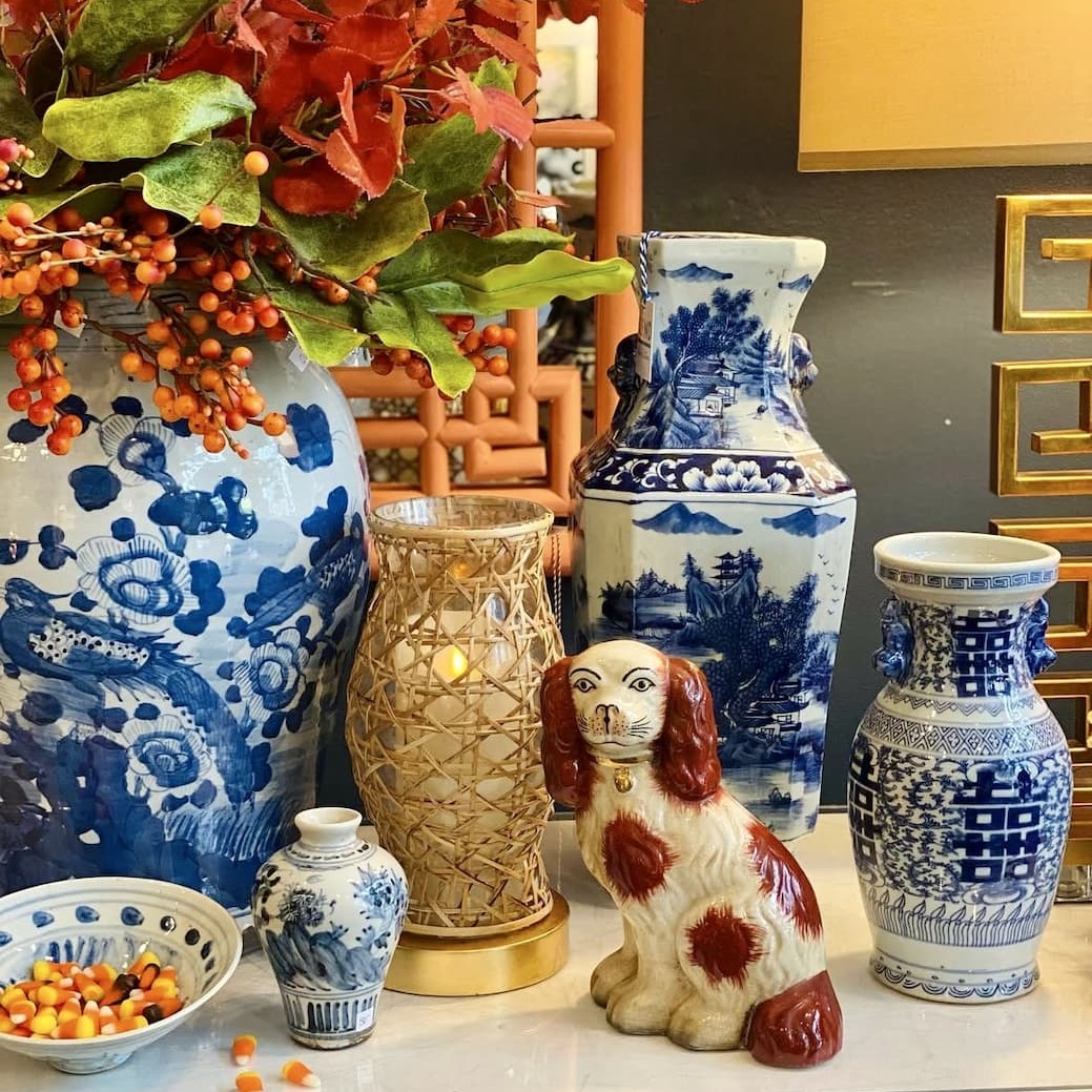 Staffordshire Dogs: Classic Staffordshire dog figurines styled in a fall-inspired, elegant home interior.