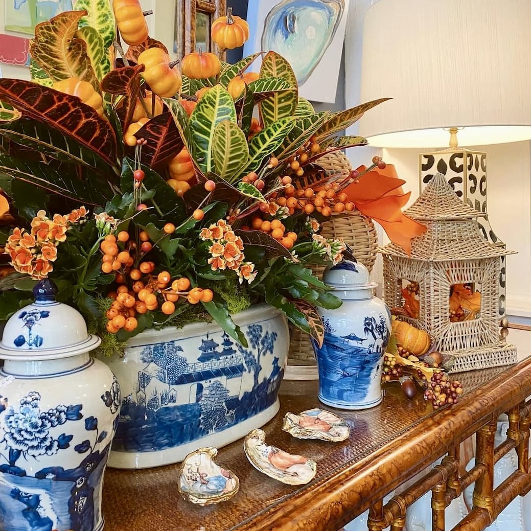 Wicker Pagoda Lantern: Natural wicker pagoda lantern styled on a summer patio, ready for fall tablescapes.
