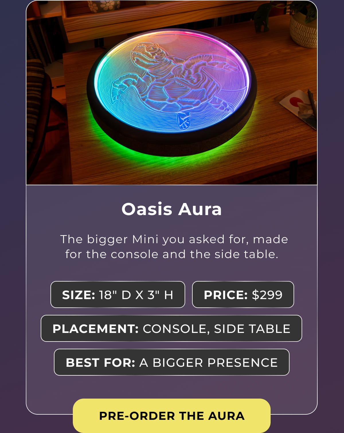 Oasis Aura kinetic sand display featuring a colorful illuminated sea turtle design on a console table.