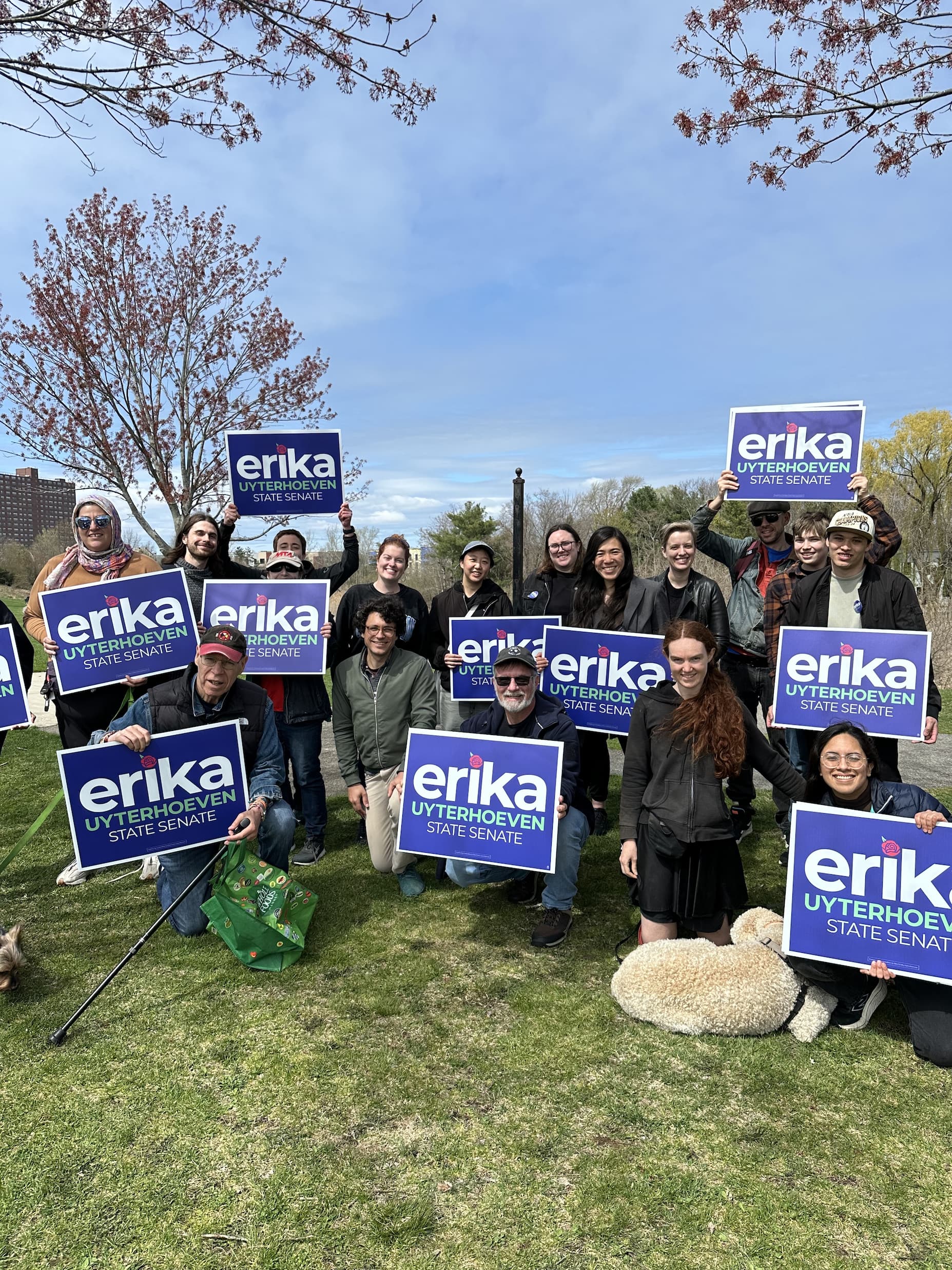 Erika with campaign supporters holding signs