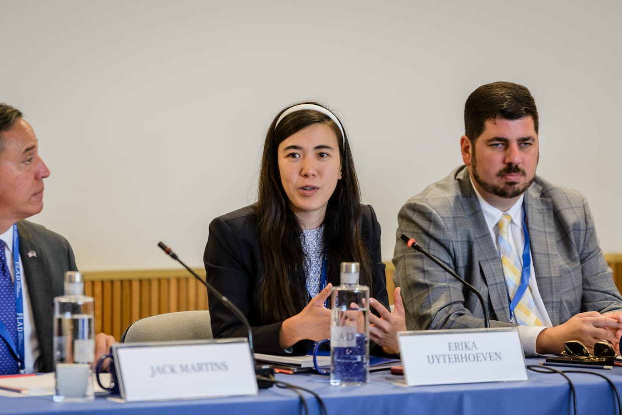 Erika speaking at an international AI governance conference