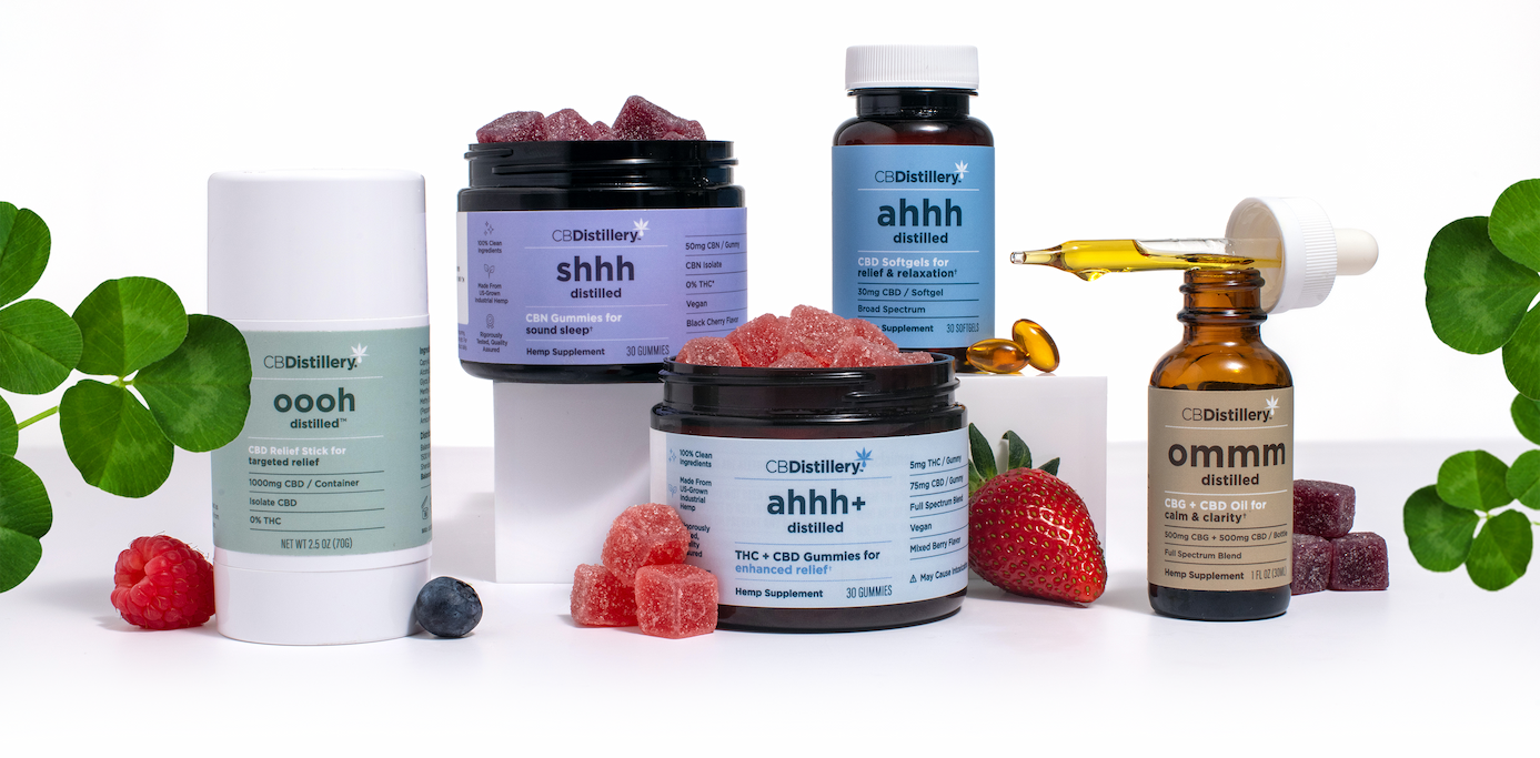 [a variety of CBDistillery photos are shown together, with clovers and fresh berries.]