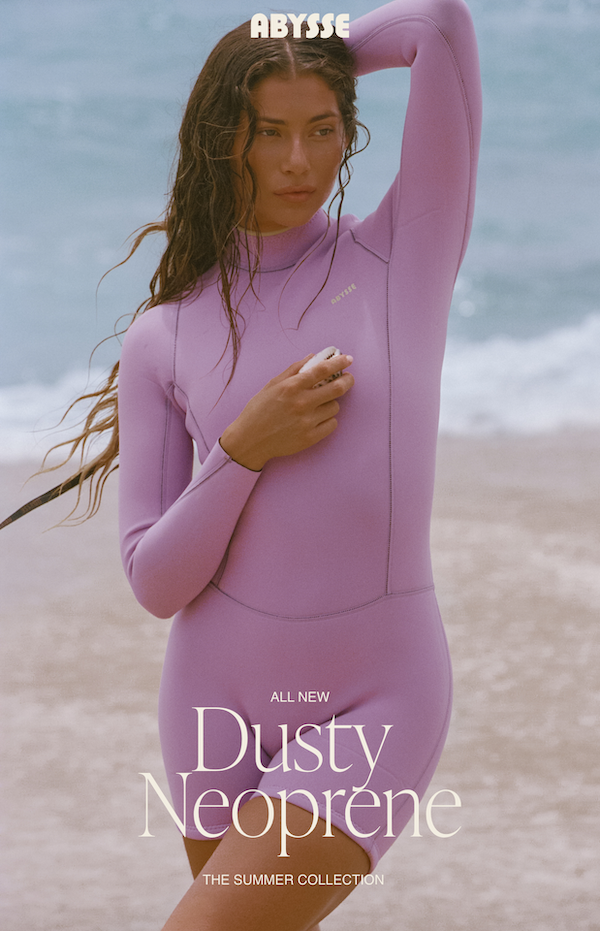 Woman wearing a dusty lavender wetsuit
