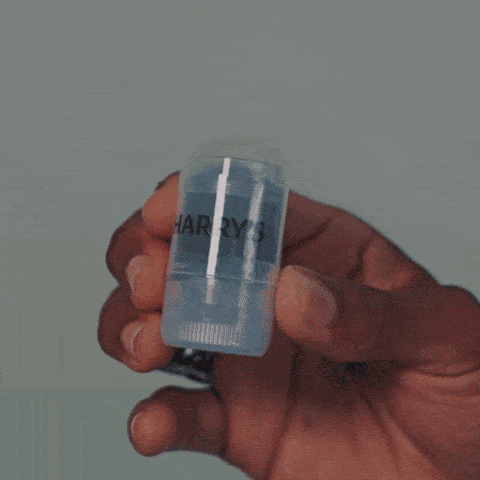 animated gif of hand holding re-hydrating stick and man using on his face