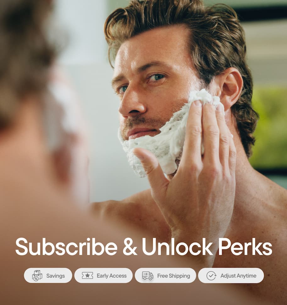 Man using shaving cream on face Man using shaving cream on face