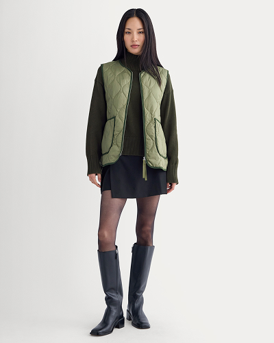 Image | Model wearing ReNew Quilted Vest | Lichen Green