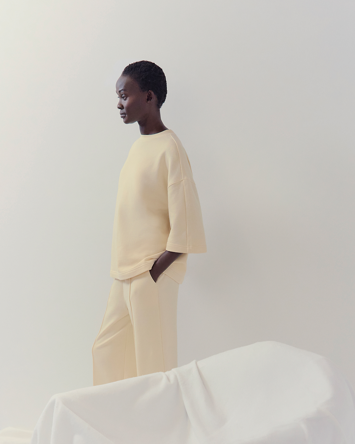 Image | Model in Lightweight Terry Oversized Tee | Parchment